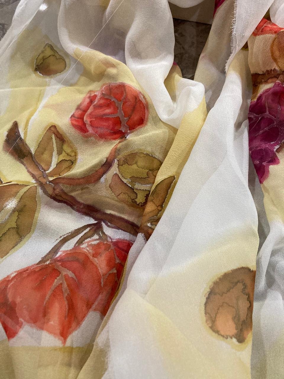 Hand-painted red roses on a cream silk scarf